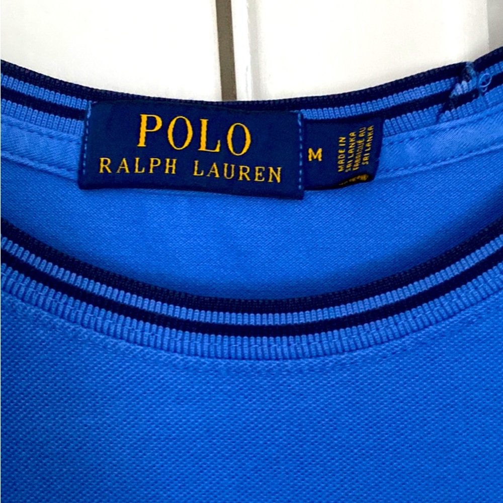 Polo by RL blue crew neck similar to a traditional polo. Mens medium